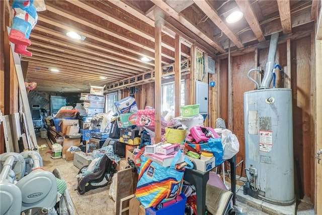 basement with electric panel and water heater