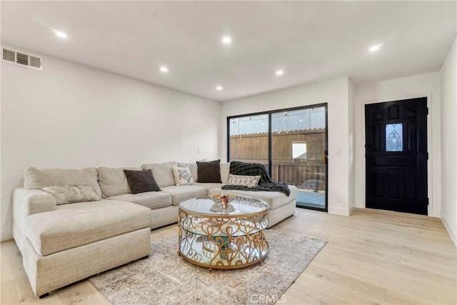 living room with light wood-type flooring