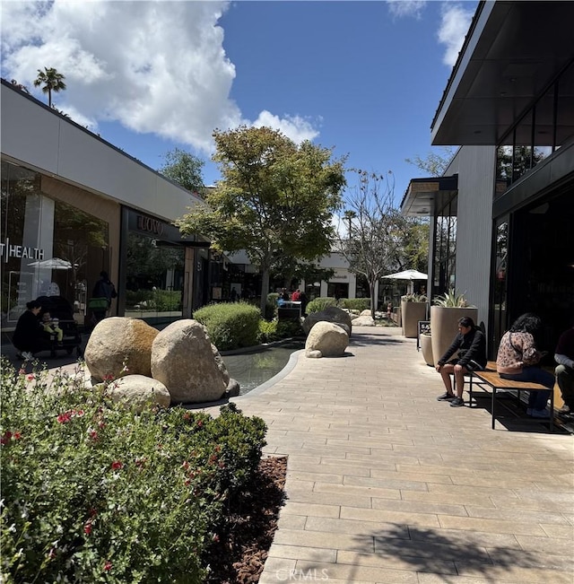 view of property's community featuring a patio