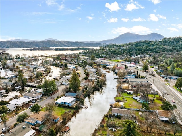 birds eye view of property featuring a mountain view