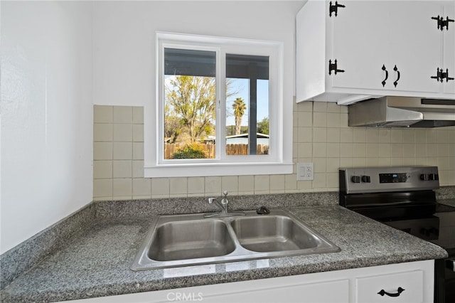 kitchen with white cabinets, sink, and stainless steel electric range