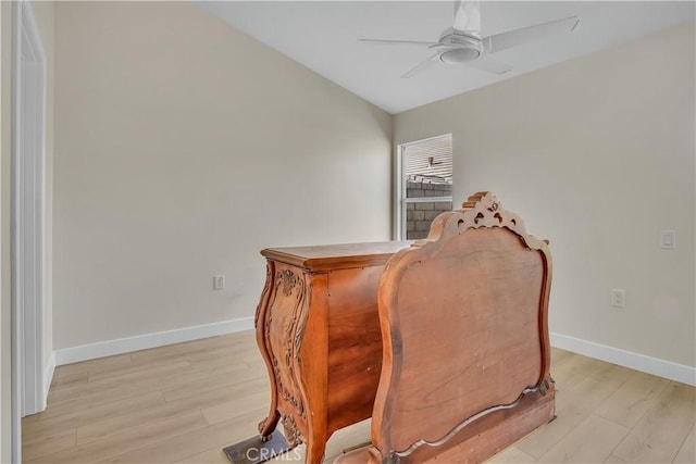 sitting room with ceiling fan and light hardwood / wood-style flooring