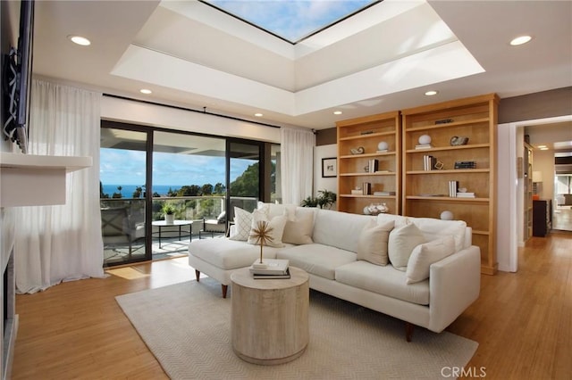 living room with light hardwood / wood-style floors