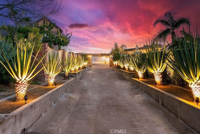 view of patio terrace at dusk