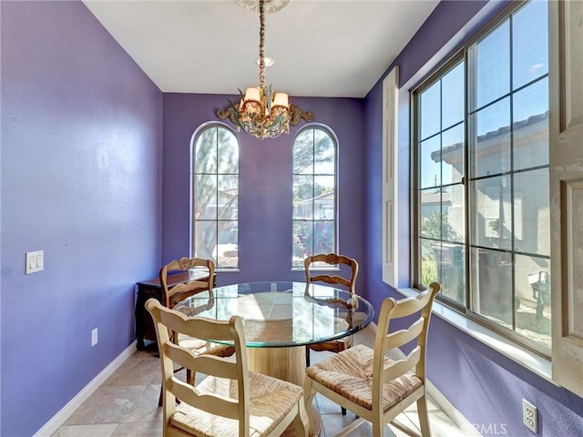 dining room with a notable chandelier