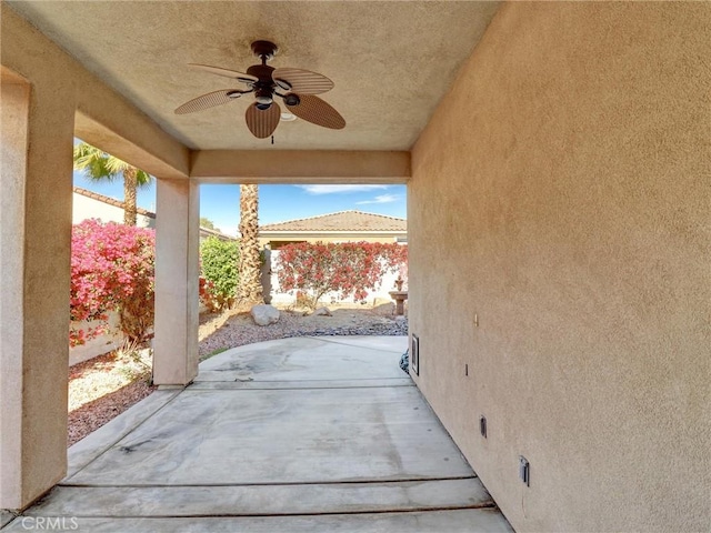 view of patio with ceiling fan