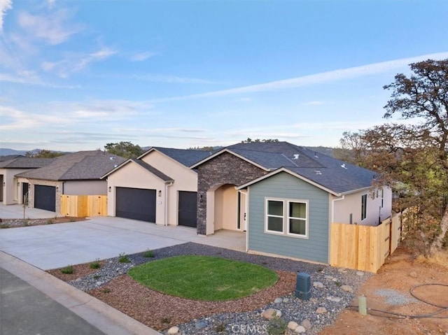 ranch-style house featuring a garage