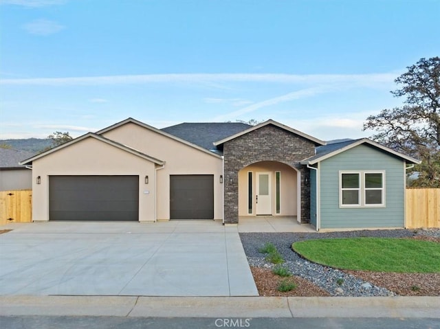 single story home with a garage