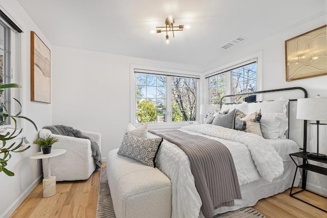 bedroom featuring light hardwood / wood-style flooring