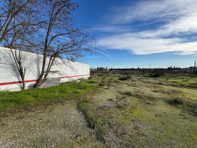 view of yard featuring a rural view