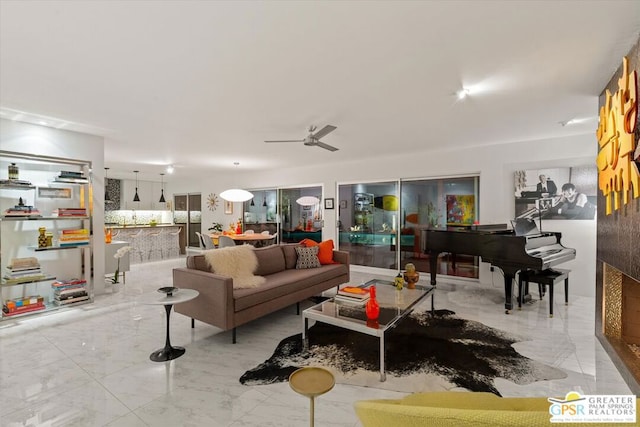 living room with ceiling fan