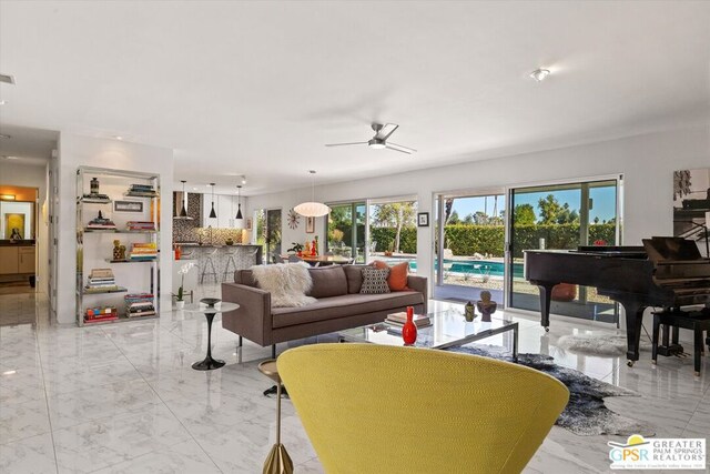 living room featuring ceiling fan