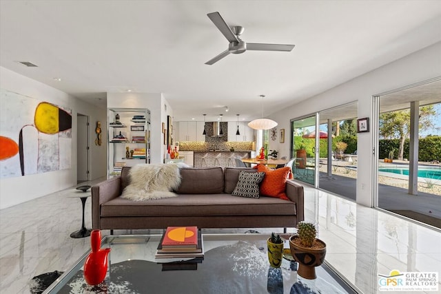 living room with ceiling fan