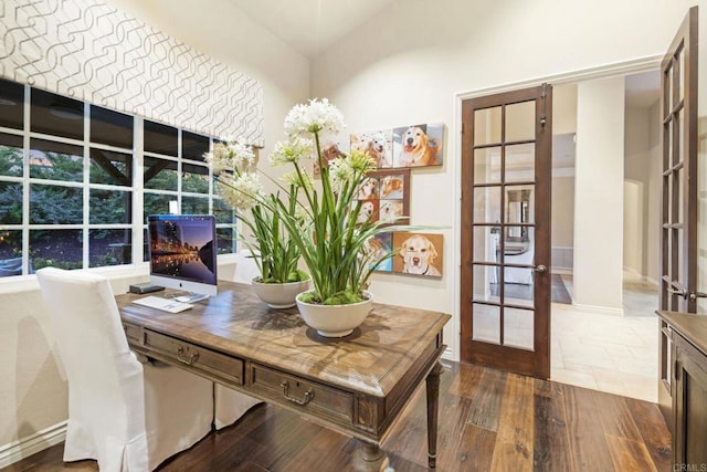 office area with dark wood-type flooring and french doors