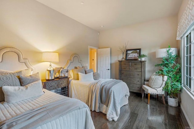 bedroom featuring dark hardwood / wood-style floors