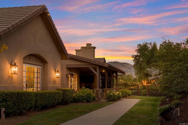 view of home's exterior featuring a yard