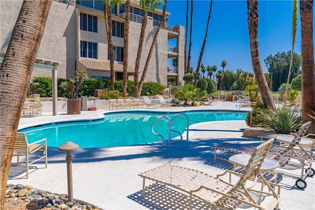 view of pool with a patio area