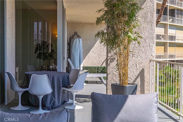 view of patio / terrace with a balcony