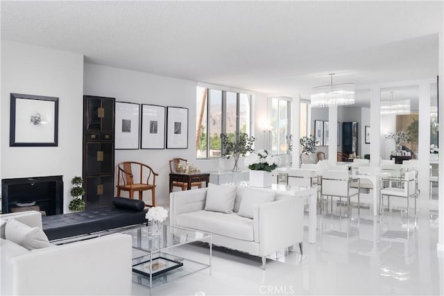 living room featuring an inviting chandelier