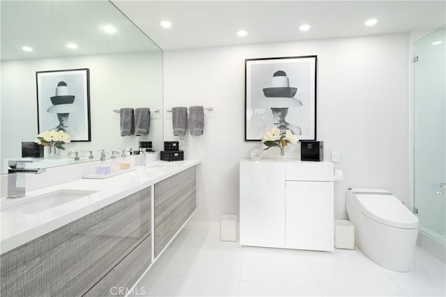 bathroom with tile patterned floors, vanity, toilet, and a shower with shower door