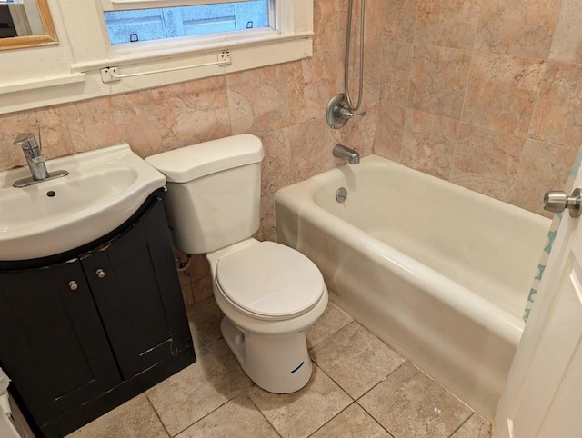 full bathroom featuring shower / bathing tub combination, vanity, and toilet