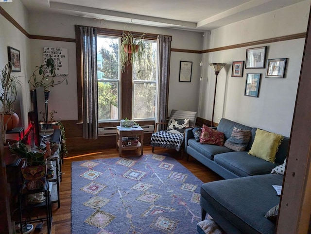 living area with hardwood / wood-style flooring