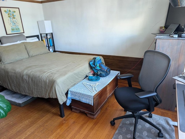 bedroom with light hardwood / wood-style flooring