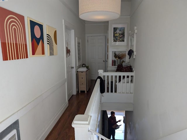 corridor featuring dark wood-type flooring