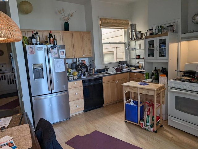 kitchen featuring white gas range, stainless steel fridge with ice dispenser, light brown cabinetry, and black dishwasher