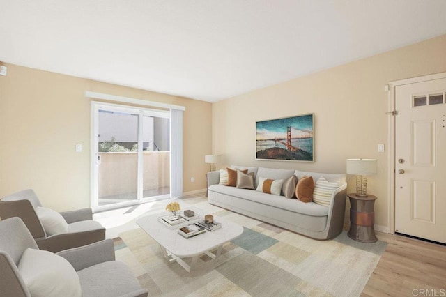 living room with light hardwood / wood-style flooring