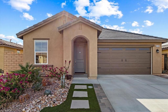 view of front of home featuring a garage