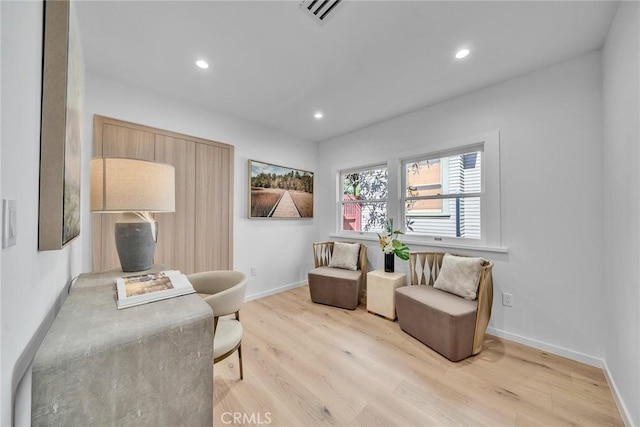 living area featuring light wood-type flooring