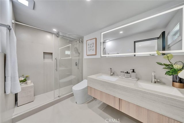 bathroom featuring toilet, walk in shower, and vanity