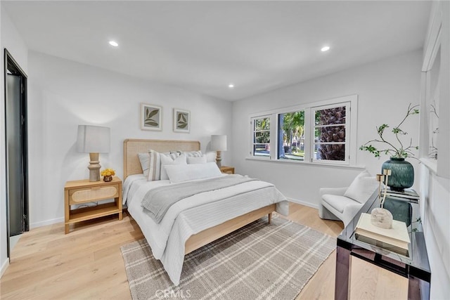 bedroom featuring light hardwood / wood-style flooring