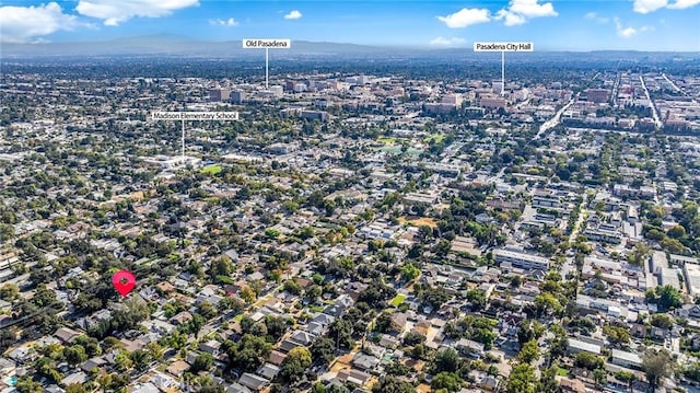 birds eye view of property featuring a mountain view