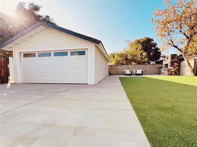 garage with a lawn