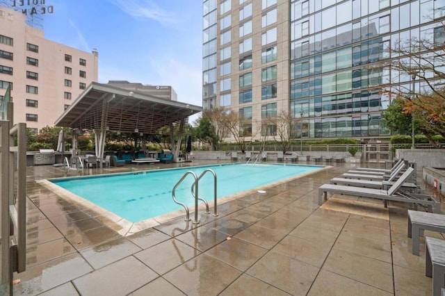 view of pool with a patio area