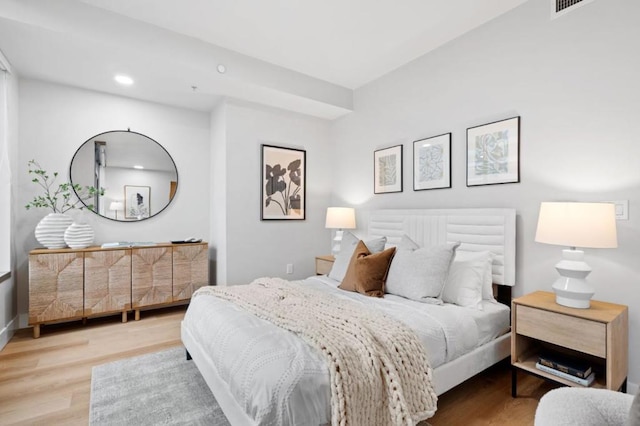 bedroom featuring light hardwood / wood-style floors