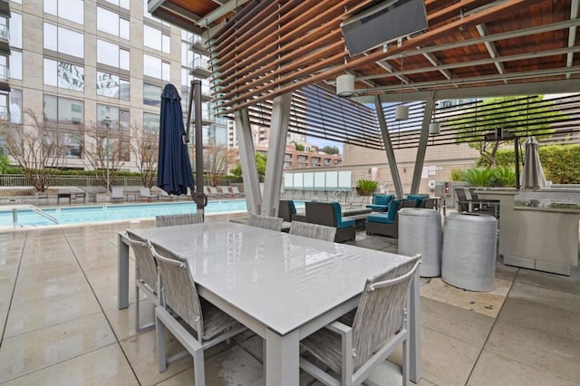 view of patio / terrace featuring an outdoor living space and a community pool