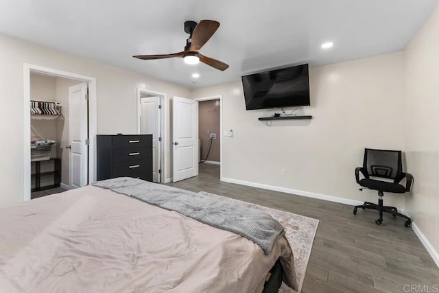 bedroom featuring ceiling fan, baseboards, wood finished floors, and recessed lighting