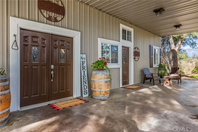 doorway to property with a porch