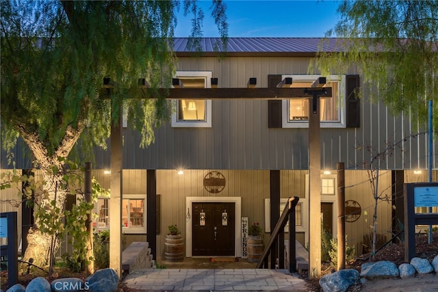 view of front of house featuring metal roof