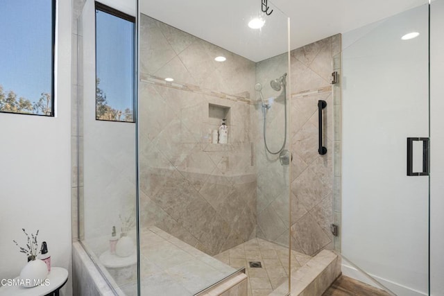 bathroom with an enclosed shower