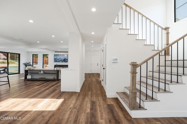 foyer entrance featuring dark hardwood / wood-style flooring