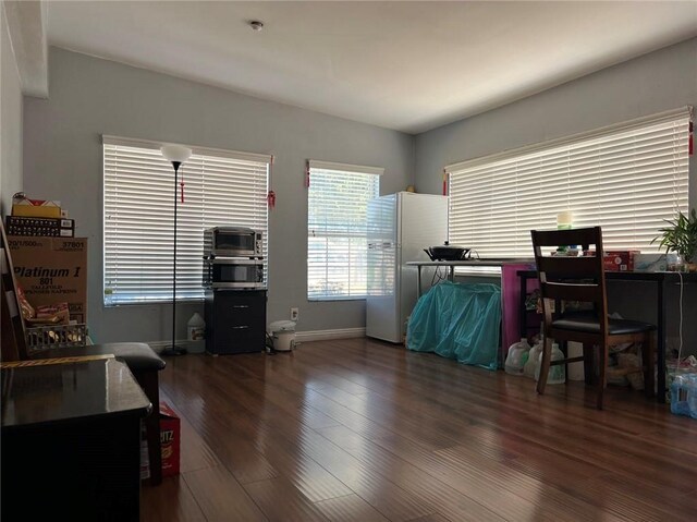 office space featuring dark wood-type flooring