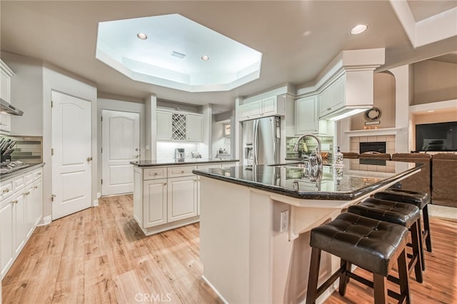 kitchen with white cabinets, stainless steel appliances, and sink