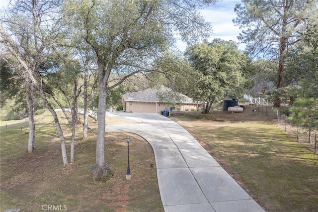 view of yard featuring a garage