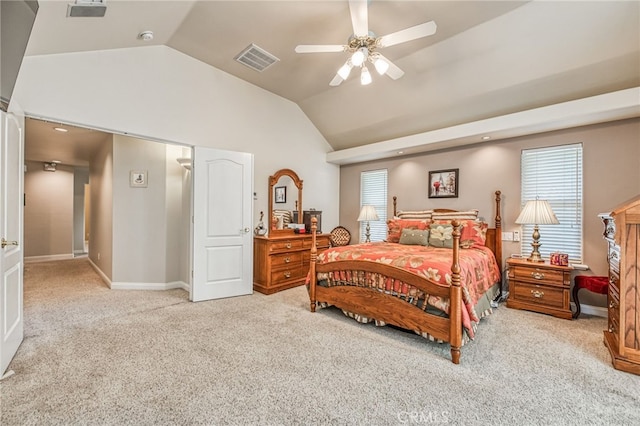 carpeted bedroom featuring ceiling fan and vaulted ceiling