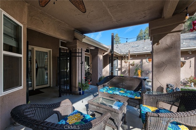 view of patio / terrace featuring an outdoor living space and ceiling fan