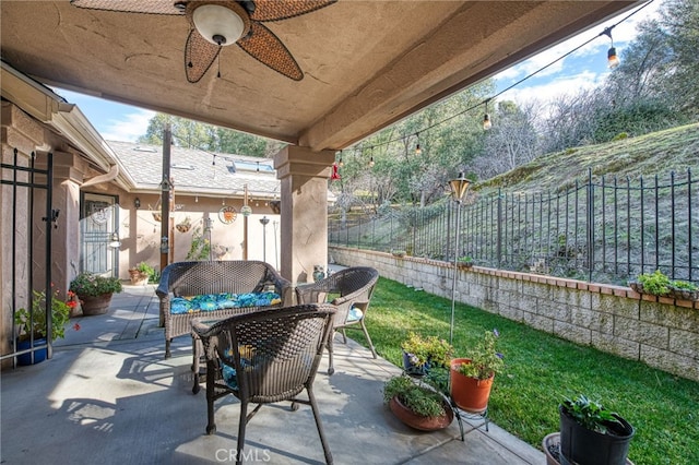 view of patio / terrace featuring ceiling fan